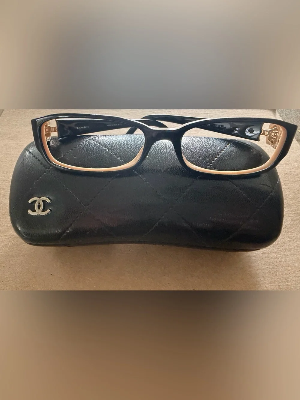 CHANEL Black Frames with Tan Inner Trim and Gold Flower with emblem on temples